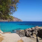 Ombrosgialos bay Chania with Rocks in places beach and Deep blue water