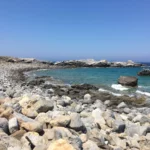 Xotikospilio beach Chania with Rocks in places beach and Blue water