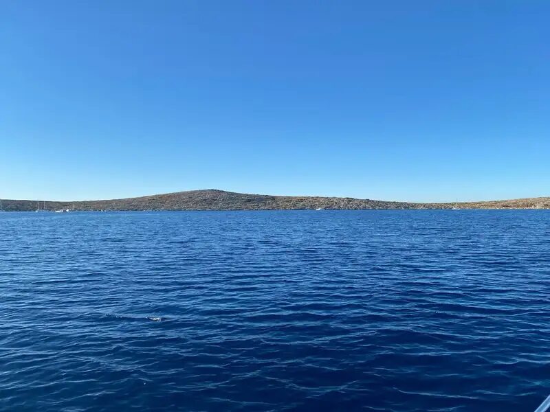 Agios Georgios bay, Dia