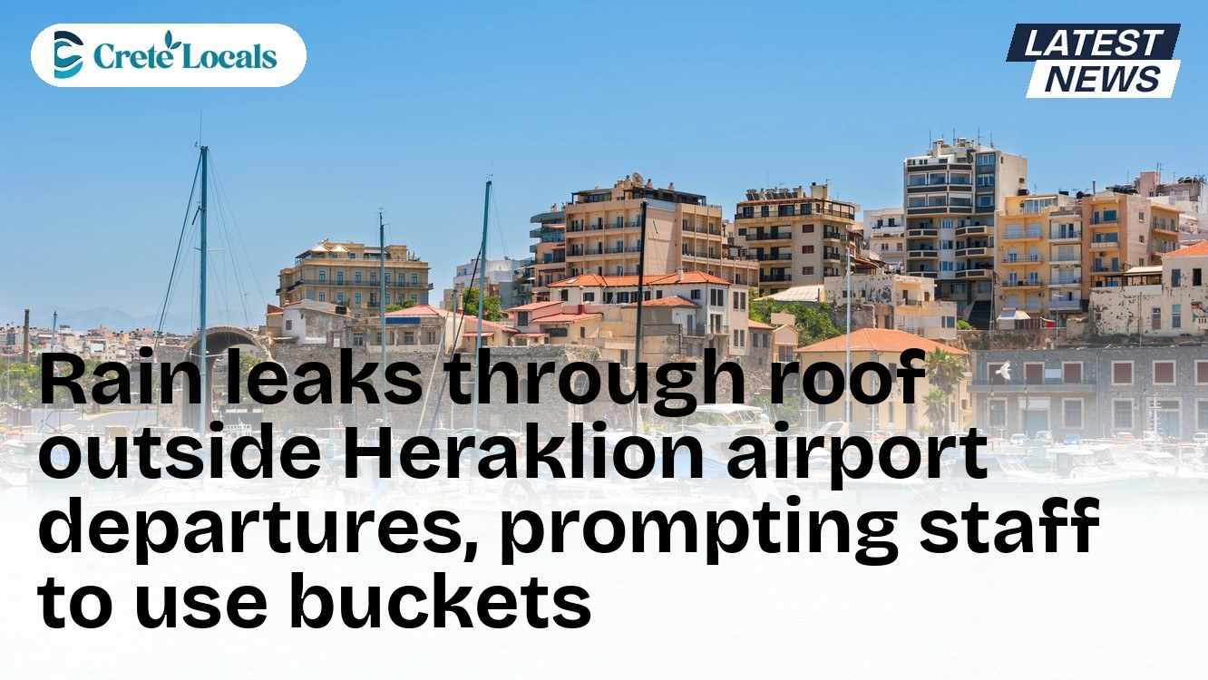 Rain leaks through roof outside Heraklion airport departures, prompting staff to use buckets